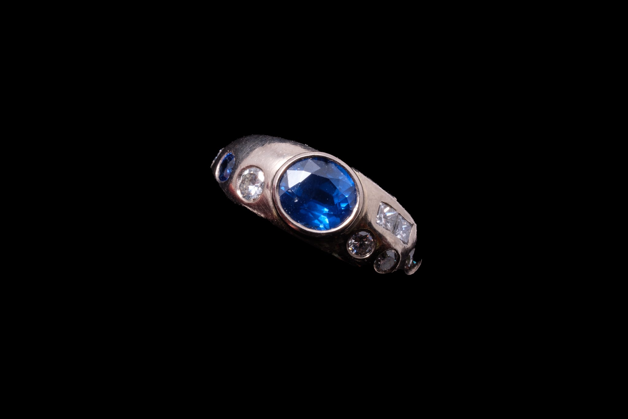 Contemporary White Gold, Sapphire and Diamond Ring.