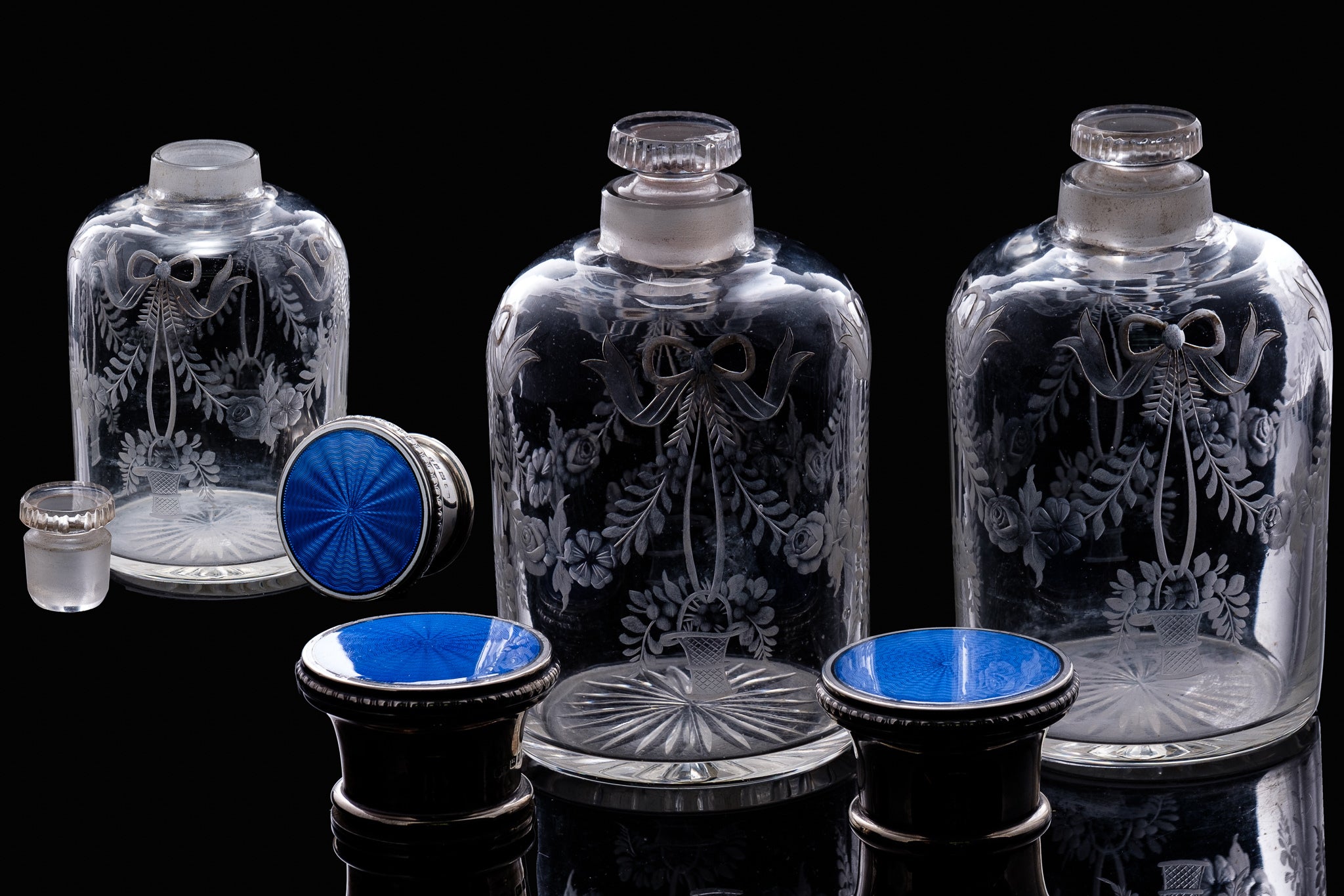 Edwardian Engraved Glass Bottles with Sterling Silver and Enamel Tops.