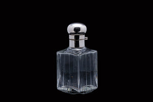 Edwardian Sterling Silver Topped Perfume Bottle.