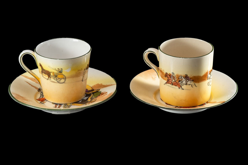 Royal Doulton Coaching Scenes Pair of Coffee Cans and Saucers.