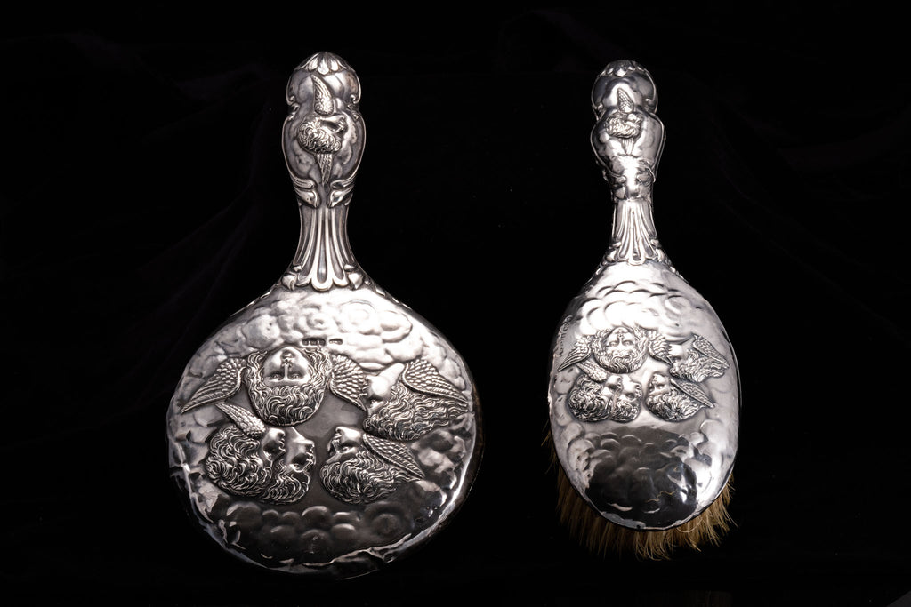 Victorian Sterling Silver Cherub Brush and Mirror Set. SOLD