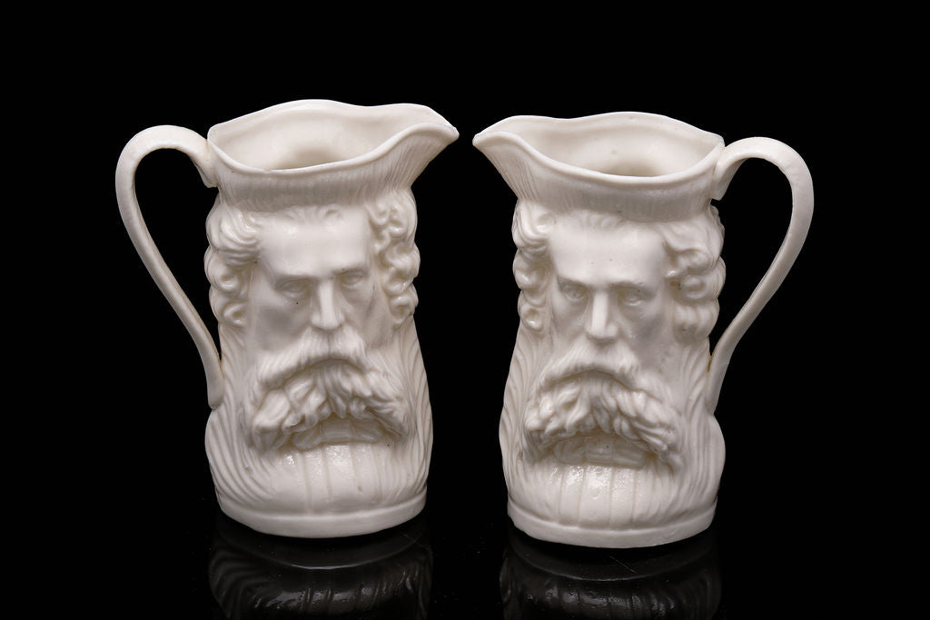 C1900 Pair of Two Faced Victorian Jugs.