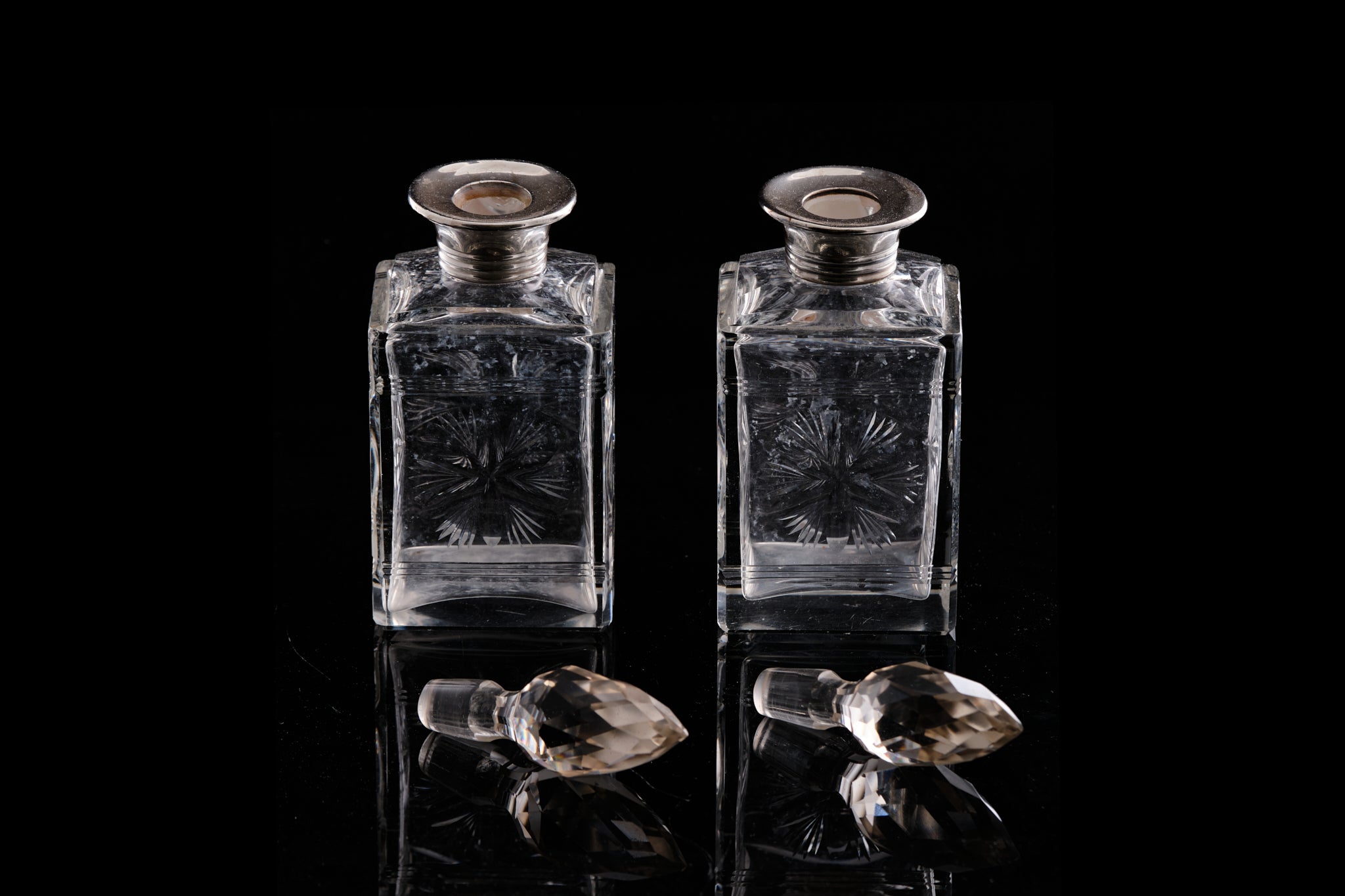 Edwardian Pair of Sterling Silver Collared Perfume Bottles.
